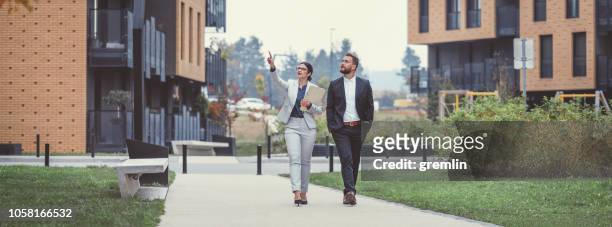 real estate agent and businessman customer - real estate agent stock pictures, royalty-free photos & images