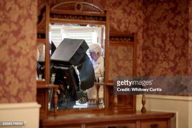 Voter casts a ballot on November 6, 2018 at Shawnee Town Hall in Shawnee, Kansas. Turnout is expected to be high nationwide as Democrats hope to take...