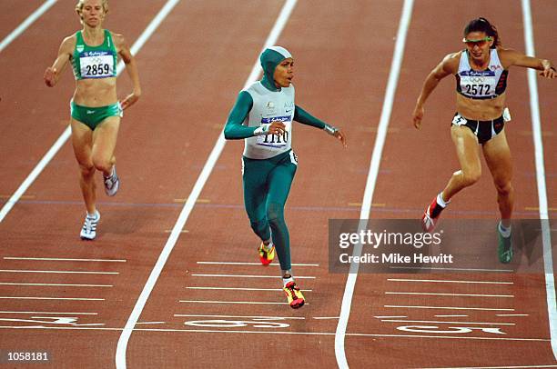 Cathy Freeman of Australia crosses the line to win gold in the Womens 400m Final at the Olympic Stadium on Day Ten of the Sydney 2000 Olympic Games...