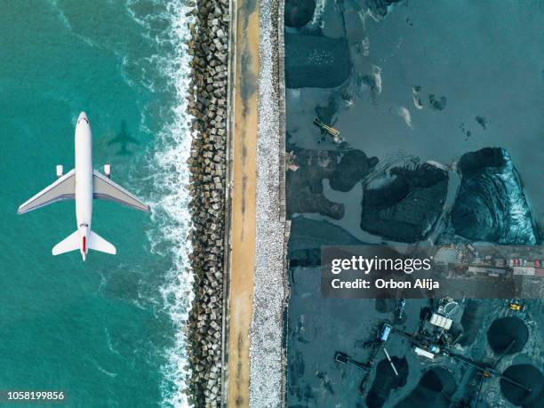 airplane flying over coal mineral exploitation - cobalt mining stock pictures, royalty-free photos & images