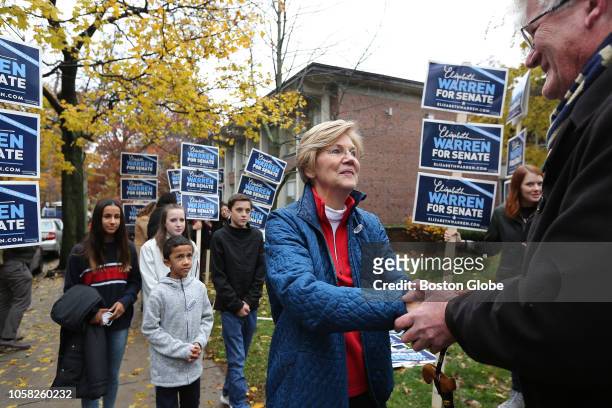 After voting, U.S. Senator Elizabeth Warren greets supporters outside the Graham & Parks School in Cambridge, MA on Election Day, Nov. 6, 2018....