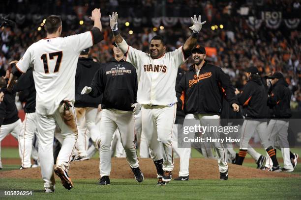 Pablo Sandoval of the San Francisco Giants celebrates after Aubrey Huff scored on a Juan Uribe sacrifice fly to win the game 6-5 over the...