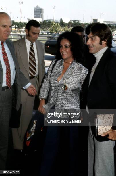 Elizabeth Taylor and Henry Wynberg during Elizabeth Taylor and Henry Wynberg Sighting - New York City - August 1, 1974 at JFK Airport in New York...