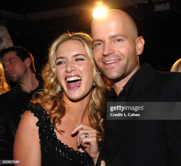 Kate Winslet and Marc Forster, director during "Finding Neverland" Los Angeles Premiere - Red Carpet at Academy of Motion Picture Arts And Sciences...