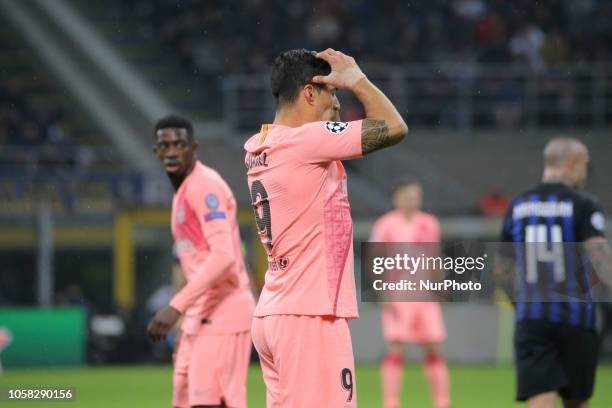 Luis Suárez of FC Barcelona reacts to a missed chance during the UEFA Champions League group B match between FC Internazionale and FC Barcelona at...