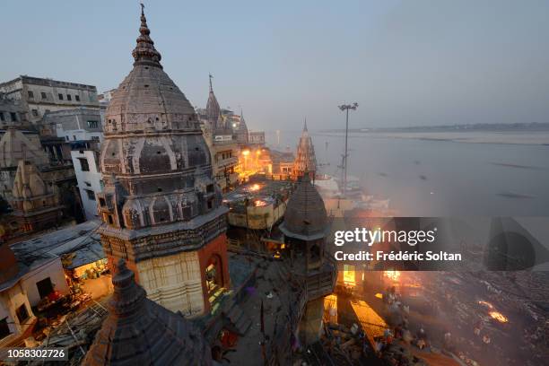 Holy City of Varanasi . Manikarnika Ghat is one of the ghats in Varanasi and is most known for being a place of Hindu cremation. Religious capital of...