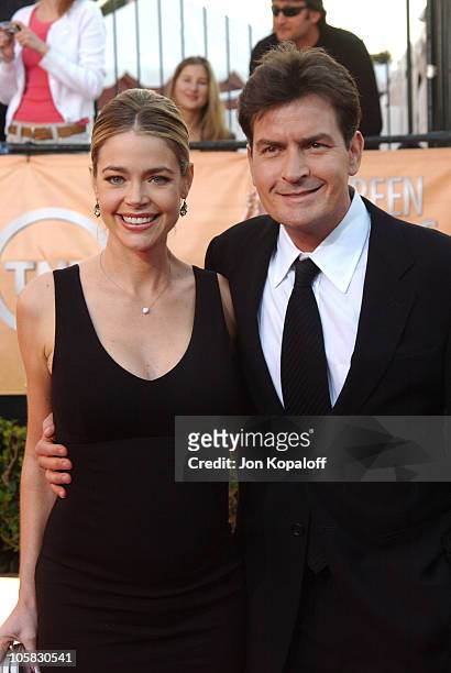Denise Richards and Charlie Sheen during 2005 Screen Actors Guild Awards - Arrivals at The Shrine in Los Angeles, California, United States.