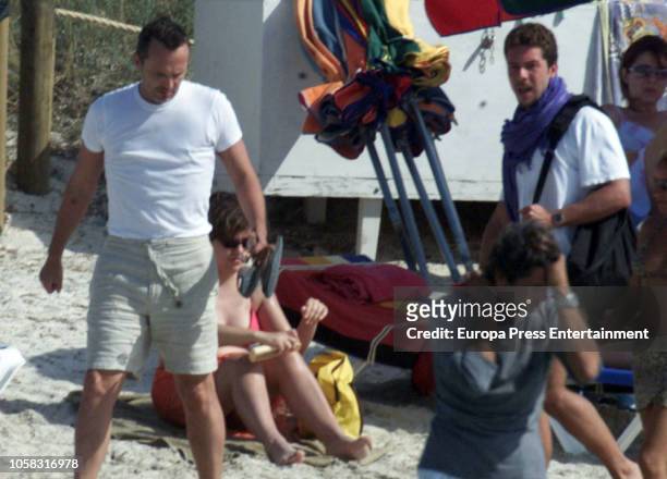 Singer Miguel Bose and scullptor Nacho Palau are seen on June 24, 2002 in Ibiza