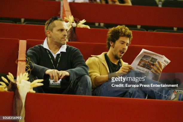 Singer Miguel Bose and scullptor Nacho Palau are seen during Mutua Madrid Open tennis tournament at the Caja Magica on October 26, 2004 in Madrid