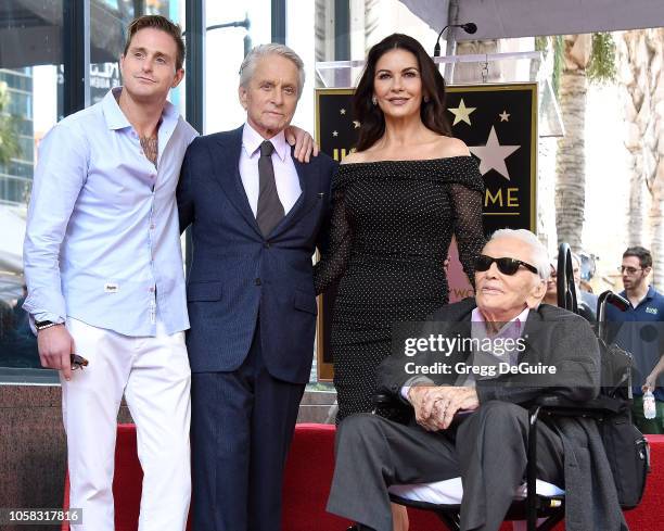 Cameron Douglas, Michael Douglas, Catherine Zeta-Jones, and Kirk Douglas pose at the Michael Douglas Star On The Hollywood Walk Of Fame ceremony on...