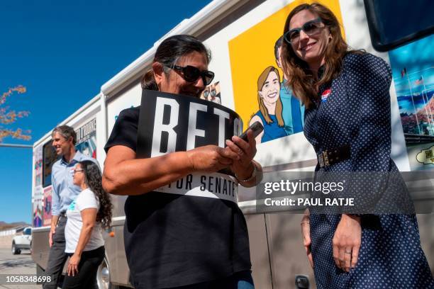 Amy Hoover Sanders , wife of Texas Senatorial Candidate Congressman Beto O'Rourke, greets constituents outside of Nixon Elementary School, as ORourke...