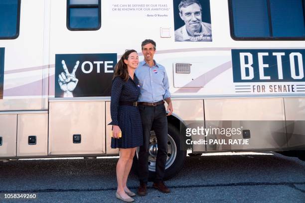 Texas Senatorial Candidate Congressman Beto ORourke and his wife, Amy Hoover Sanders, are pictured in front of a campaign RV outside of Nixon...