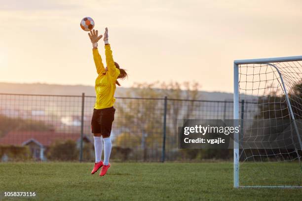 female soccer player - woman goalie stock pictures, royalty-free photos & images