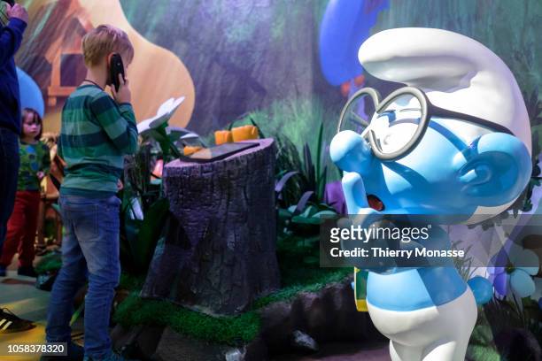 Childrens enjoy the Smurf exhibition during the ceremony for 60th Anniversary of the Schtroumpf on October 23, 2018 in Brussels, Belgium. The...