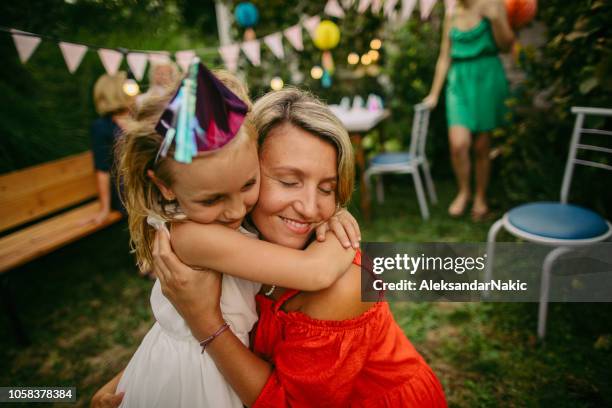 a hug for my birthday girl - mother congratulating stock pictures, royalty-free photos & images
