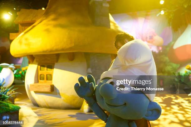 Childrens enjoy the Smurf exhibition during the ceremony for 60th Anniversary of the Schtroumpf on October 23, 2018 in Brussels, Belgium. The...