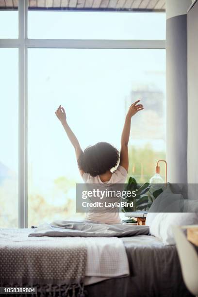 embrace each day - morning bed stretch stock pictures, royalty-free photos & images