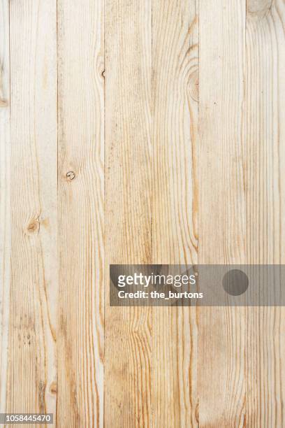 full frame shot of wooden wall - holzplatte stock-fotos und bilder