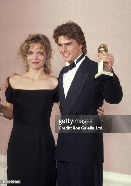 Michelle Pfeiffer and Tom Cruise during The 47th Annual Golden Globe Awards at The Beverly Hilton Hotel in Beverly Hills, California, United States.