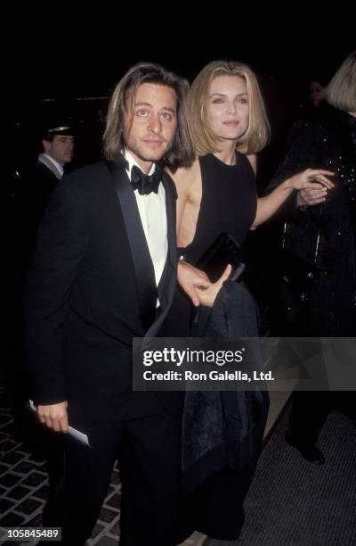 Fisher Stevens and Michelle Pfeiffer during 49th Annual Golden Globe Awards at Beverly Hilton Hotel in Beverly Hills, California, United States.