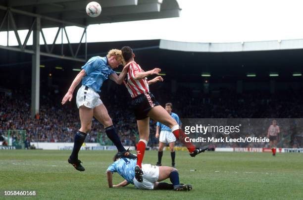 May 1991 - Football League Division One - Manchester City v Sunderland - Colin Hendry of Man City and Kevin Ball of Sunderland go up for a header - .