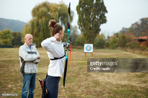 archery training - archery stock pictures, royalty-free photos & images