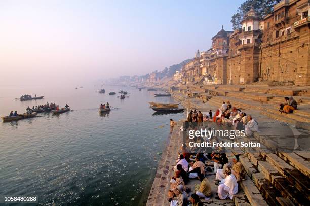 Morning bath in the Ganges in Holy City of Varanasi . Religious capital of Hinduism, Varanasi is closely associated with the Ganges River and is one...