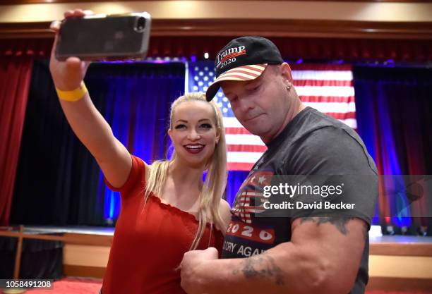 Mindy Robinson takes a selfie with John Wayne Bobbitt at the Nevada Republican Party's election results watch party at the South Point Hotel & Casino...