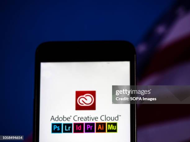 In this photo illustration, the Adobe Creative Cloud logo seen displayed on a smartphone. Adobe Creative Cloud is a set of applications and services...