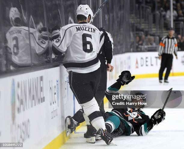 Kiefer Sherwood of the Anaheim Ducks falls to the ice after a bodycheck from Jake Muzzin of the Los Angeles Kings during the third period in a 4-1...