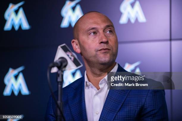 Chief Executive Officer Derek Jeter of the Miami Marlins speaks with members of the media to announce the signing of the Mesa brothers at Marlins...