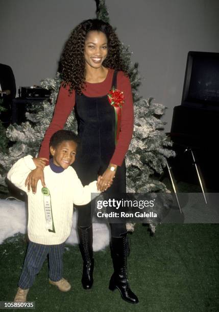 Garcelle Beauvais and Son Oliver Saunders during 63rd Annual Hollywood Christmas Parade at KTLA Studios in Los Angeles, CA, United States.