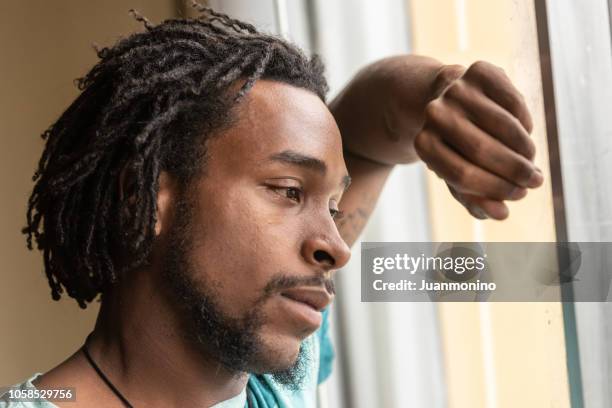 sad afro american man - afro caribbean and american stock pictures, royalty-free photos & images