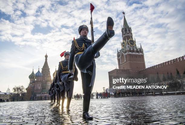 Russian honour guards march during the military parade at Red Square in Moscow on November 7, 2018. - Russia marks the 77th anniversary of the 1941...