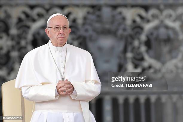 Pope Francis stands during the weekly general audience on November 7, 2018 at St. Peter's square in the Vatican.
