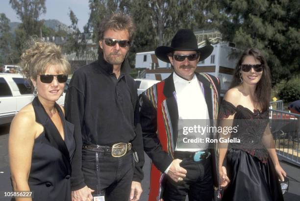 Ronnie Dunn and wife Janine Dunn, and Kix Brooks and wife Barbara Brooks