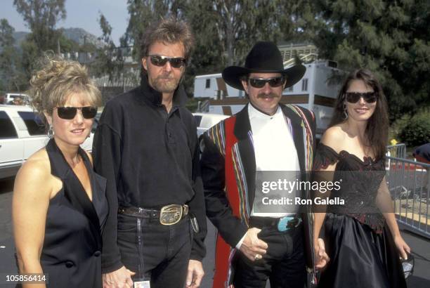 Ronnie Dunn and wife Janine Dunn, and Kix Brooks and wife Barbara Brooks