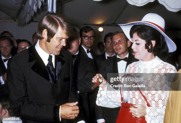 Glen Campbell and wife Billie Jean Nunley during Honor America Day at Washington, D.C. In Washington, D.C., United States.