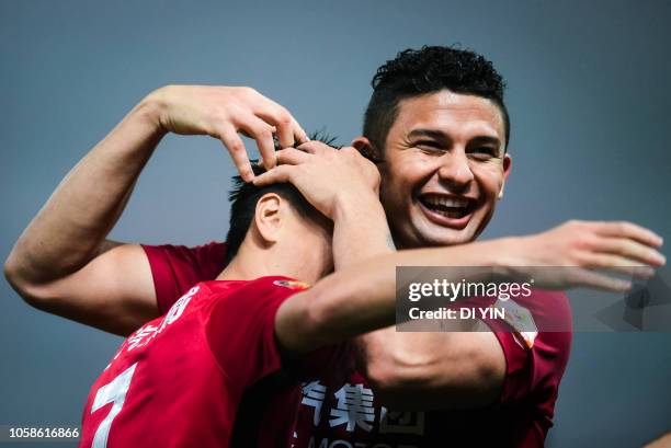 Wu Lei of Shanghai SIPG celebrates a goal with Elkeson de Oliveira Cardoso during the 2018 Chinese Super League title match between Shanghai SIPG v...