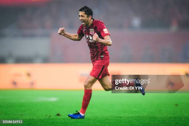 Akhmedov of Shanghai SIPG celebrates a goal during the 2018 Chinese Super League title match between Shanghai SIPG v Beijing Renhe at Shanghai...