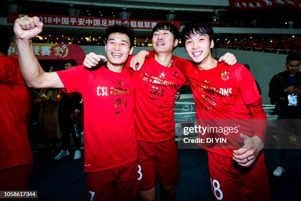 Wu Lei of Shanghai SIPG celebrates with teammates after winning the Chinese Super League championship against Beijing Renhe during the 2018 Chinese...