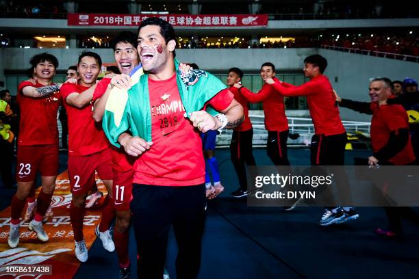 Hulk of Shanghai SIPG celebrate with teammates after win the champion of Chinese Super League against Beijing Renhe during the 2018 Chinese Super...