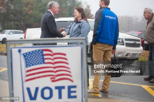 Gubernatorial candidate Shawn Moody greets Pam Eastman of Hiram after voting at Gorham Middle School on Tuesday, Nov. 6, 2018.