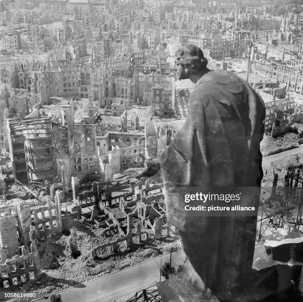 The photo by famous photographer Richard Peter sen, shows the view from the tower of the city hall southwards over the destroyed city of Dresden with...