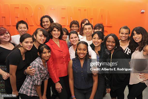 Congresswoman Lucille Roybal-Allard poses with students at a reception at Inner City Arts on October 20, 2010 in Los Angeles, California.