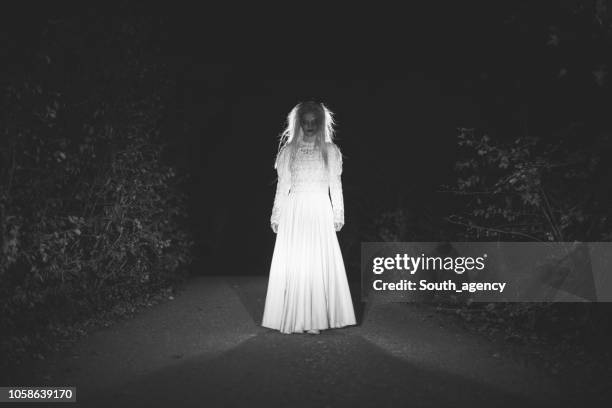 witch in white - ghost stock pictures, royalty-free photos & images