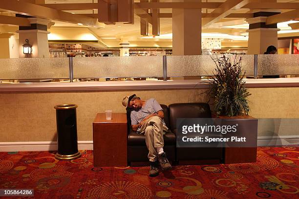 Man lies passed out at a casino on Las Vegas Boulevard on October 20, 2010 in Las Vegas, Nevada. Nevada once had among the lowest unemployment rates...