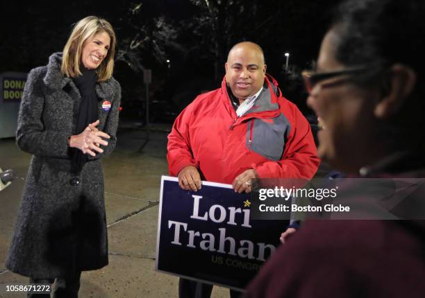 Lori Trahan, the Democratic candidate for the open Massachusetts Third Congressional District seat, left, talks to voters as she makes a campaign...