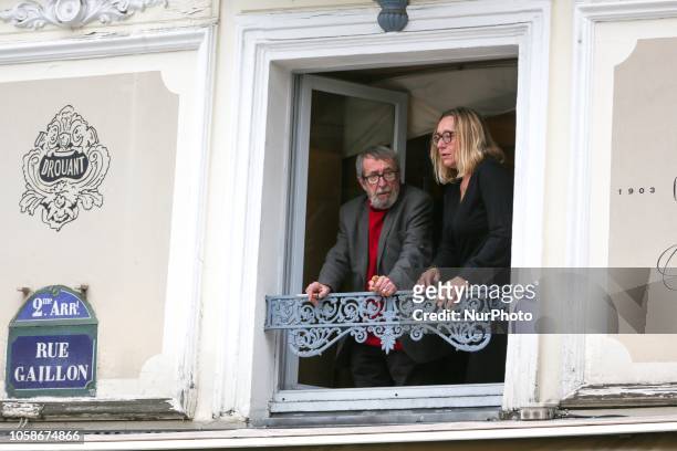 French writers and members of jury for Frances Goncourt literary prize Virginie Despentes and Patrick Rambaud talk to one another on the balcony of...