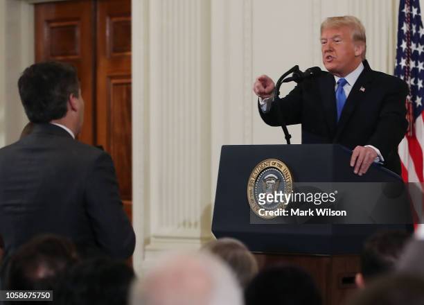 President Donald Trump gets into an exchange with Jim Acosta of CNN after giving remarks a day after the midterm elections on November 7, 2018 in the...